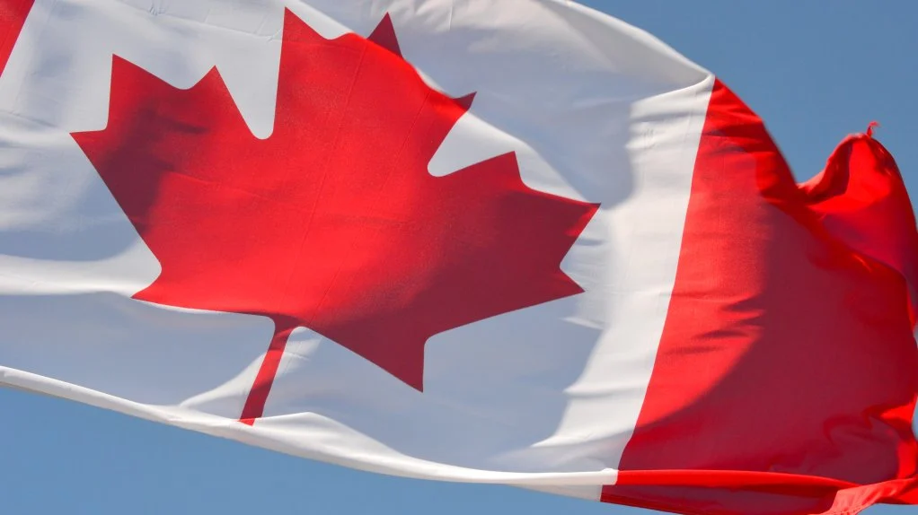 Canadian flag representing the latest Express Entry permanent residence invitation round