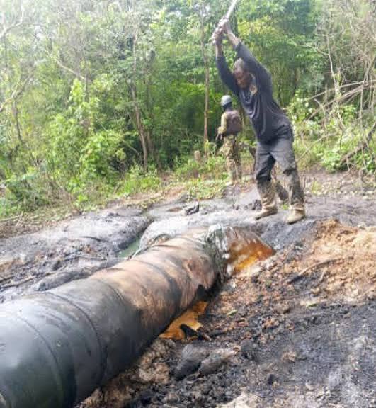 Nigerian Navy personnel dismantling illegal refining facilities during an operation in Rivers State
