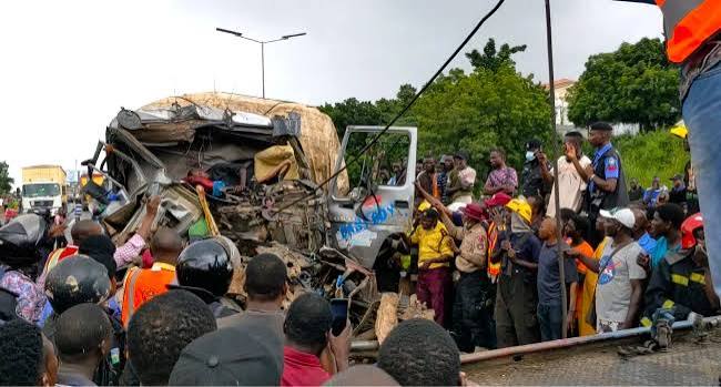 Emergency responders at the scene of a multiple-vehicle crash near Otedola Bridge