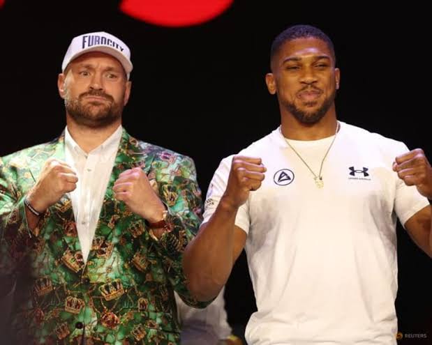 Tyson Fury and Anthony Joshua face off ahead of their December 11 heavyweight fight