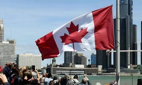 Canadian national flag accompanying a report on Nigerian-born Joseph Adams' election victory in Ontario.
