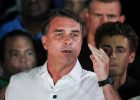 Brazilian presidential candidate Flávio Bolsonaro addressing journalists following his election defeat to President Lula.