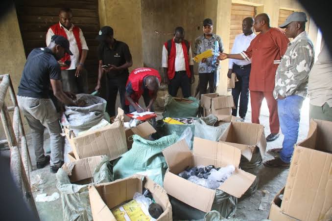 Beverage cans and packaging materials recovered during a NAFDAC operation in Lagos