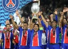 Paris Saint-Germain players celebrating a football victory, illustrating the club's first-place position in Planet Football's ranking.